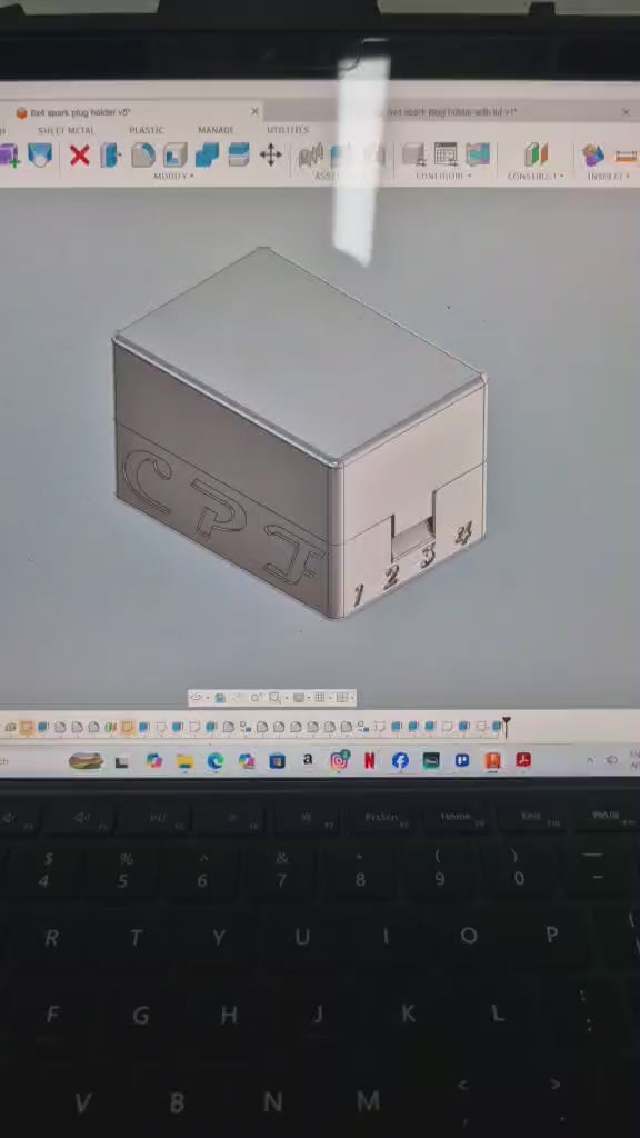 Spark plug holders
