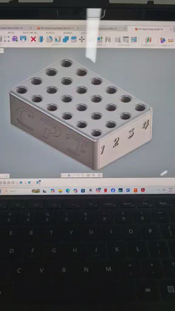 Spark plug holders